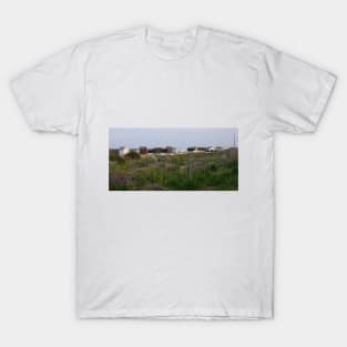 Beach huts on Kingsdown Beach Kent England T-Shirt